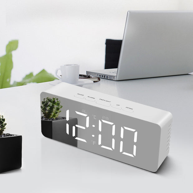 Eprolo multi-function desk clock displaying time in an office setting with a minimalist design.