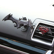 Eprolo Batman Gravity Buckle Car Phone Holder displayed on a car vent with a Superman holder, blending functionality and style for phone navigation.