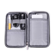Open view of the Travel Storage Bag Kit by eprolo, featuring multiple compartments for tech accessories.