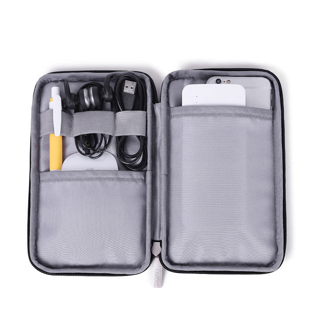 Open view of the Travel Storage Bag Kit by eprolo, featuring multiple compartments for tech accessories.
