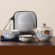 Another view of the Portable Blue And White Beige Ru Kiln Travel Tea Set by eprolo, showcasing the beautiful ceramic teapot and cups along with a convenient carrying case.