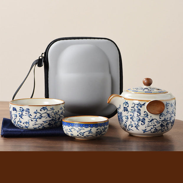 Another view of the Portable Blue And White Beige Ru Kiln Travel Tea Set by eprolo, showcasing the beautiful ceramic teapot and cups along with a convenient carrying case.