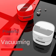 Stylish red and white mini desktop vacuum cleaner by eprolo, showcasing powerful suction capabilities, perfect for quick clean-ups at home or office.