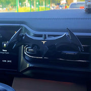 Eprolo Batman Gravity Buckle Car Phone Holder in use on a car dashboard, showcasing its unique bat silhouette while securely holding a phone.